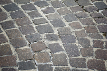 Fototapeta premium historic paving of stone pebbles outdoor background
