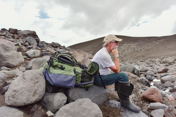 Rest of the researcher/Volcanologist resting on the pass between the volcanoes Koryak and Avacha