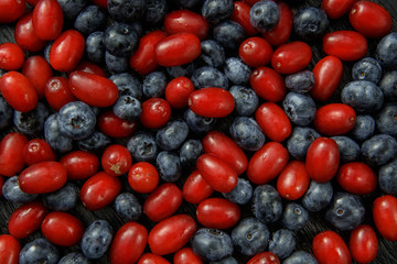 different fresh berries as background