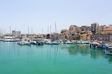 marina with boats in the town