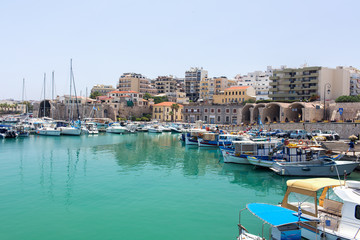marina with boats in the town