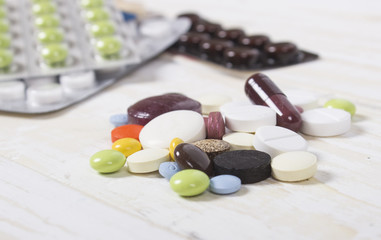 Meny different colourfull pills in strips. Medicine background f