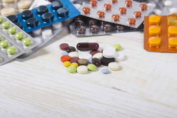 Meny different colourfull pills in strips. Medicine background f