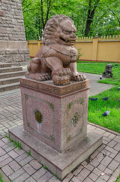 Saint Petersburg, Russia. The Buddhist temple Datsan Gunzechoinei. The chinese guardian lion (Foo Dog) near the entrance.