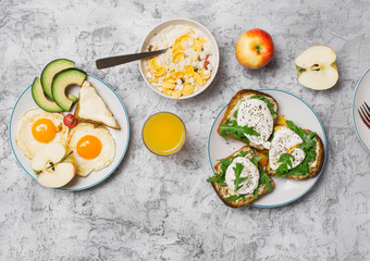 Helpful breakfast on light surface, top view