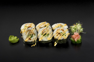 Delicious set Japanese sushi rolls. Hosomaki decorated with wasa
