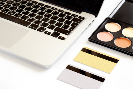 cosmetics discount card online shopping with laptop