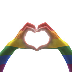 Rainbow color flag pattern on woman human hands forming in heart shape on white background:...