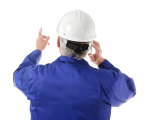 Construction worker with cellphone, isolated on white