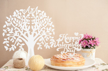 Acrylic tree, bouquet of flowers and a delicious cake