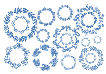 Blue hand drawn wreaths. Decoration frames. Hand drawn borders. Vector illustration.