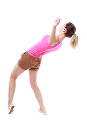 Balancing young woman. or dodge falling woman. Isolated over white background. Sport blond in brown shorts slipped and falls.