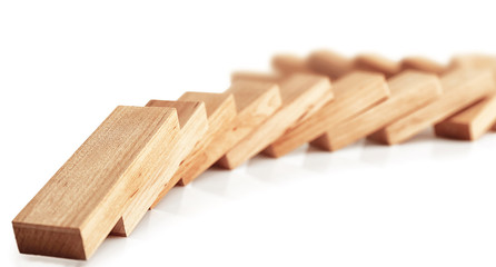 Wooden dominoes on white background