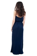 Naklejka premium back view of standing young beautiful woman. Curly dark girl is back in an evening dress.