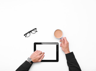 Man working with tablet, top view