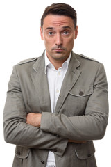 sad businessman looking at camera