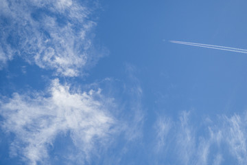 Jets flying in the sky with clouds in the morning.