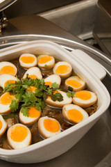 Stewed eggs or eggs and pork in brown sauce