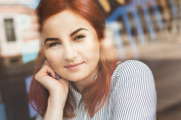 Young Attractive Woman in Cafe