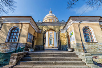 Saint Petersburg, Russia, April 03, 2016. Alexander Nevsky lavra. Holy Trinity Cathedral and the gate of St.Nicholas(Nikolskoye) cemetery