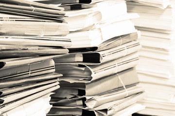 Piles of paper in the office.