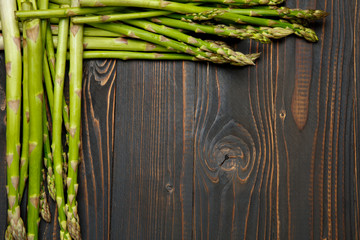 harvested asparagus on wooden