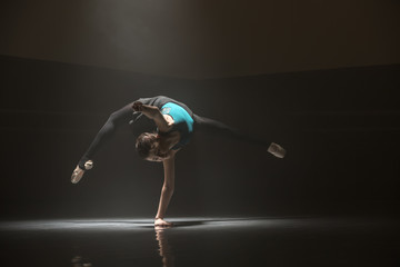 Single ballerina in class room