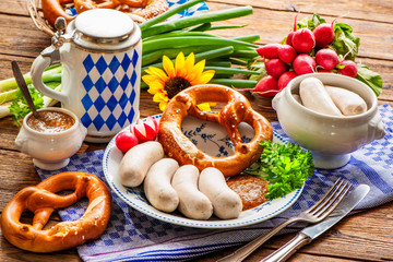 White sausages with sweet mustard and pretzel. Oktoberfest menu