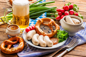 White sausages with sweet mustard and pretzel. Oktoberfest menu