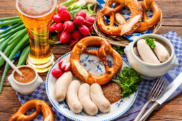 White sausages with sweet mustard and pretzel. Oktoberfest menu