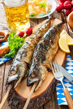Grilled mackerel fish with beer and pretzel