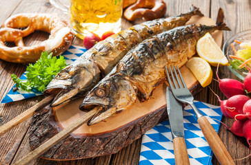 Grilled mackerel fish with beer and pretzel