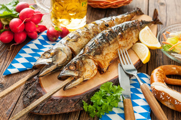 Grilled mackerel fish with beer and pretzel