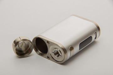 Dismantled parts of the electronic cigarette on a white backgrou