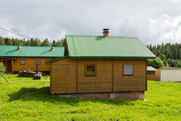 Wooden house in Complex of Kornilie-Paleostrovsky monastery on Paliy island, Onega lake, Karelia, Russia