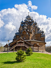 Saint Petersburg suburbs, Russia, May 4, 2015. Bogoslovka manor complex. The Pokrovskaya church in clouds at the Easter day.