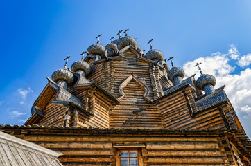 Fototapeta na wymiar Saint Petersburg suburbs, Russia, May 4, 2015. Bogoslovka manor complex. The domes of the Pokrovskaya church.
