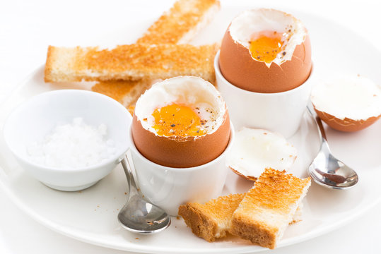 boiled eggs and crispy toast for breakfast, closeup