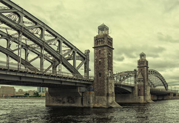 Fototapeta premium Saint Petersburg, Russia, a view of Bolsheokhtinsky bridge over the Neva river at a very cloudy spring day.