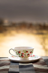 Tea cup on a stormy weather background