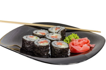 Japanese sushi made with rice, fish and seaweed with ginger and wasabi