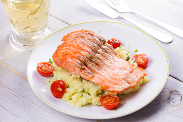 Salmon, Tomato and Smashed Potato with  Spring Onion and Coriander