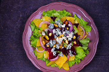 Blue Cheese, Orange, Beetroot, Red Onion and Pistachios Salad. View from above, top studio shot