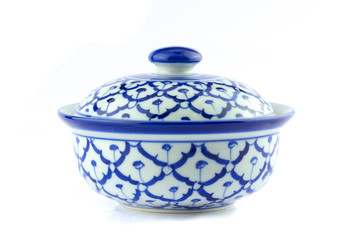 Thai ceramic bowl old style paint blue color foliage pattern or Lai-Karm isolated on white.