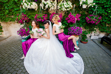 Amazing happy bride with her beautiful bridesmaids