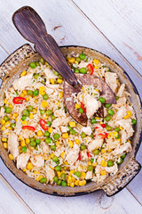Chicken Breasts with Rice, Peas, Corn and Chili. View from above, top studio shot
