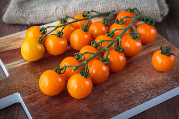 Fototapeta na wymiar Fresh orange cherry tomatoes