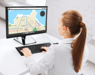 businesswoman with gps navigator map on computer