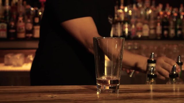 Berman preparing cocktail