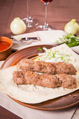 sausage with onion and parsley